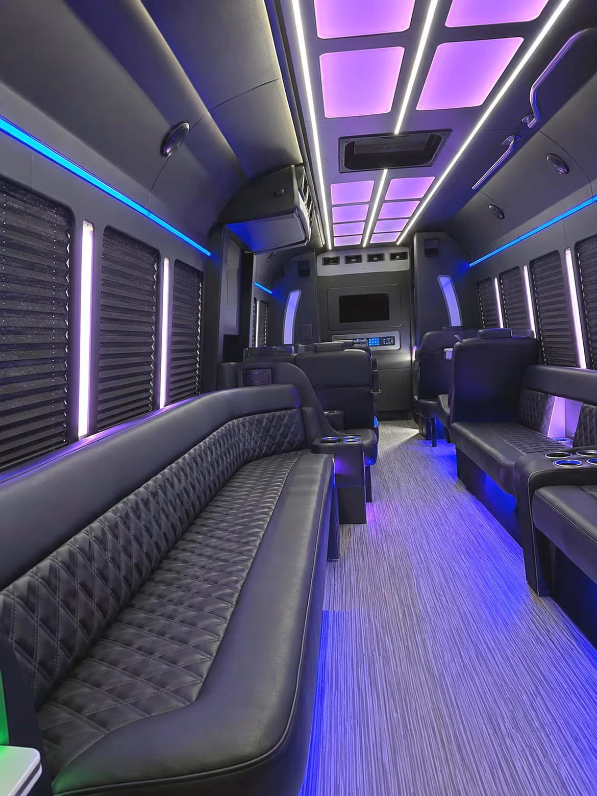 Wedding guests seated inside a party bus serving Philadelphia